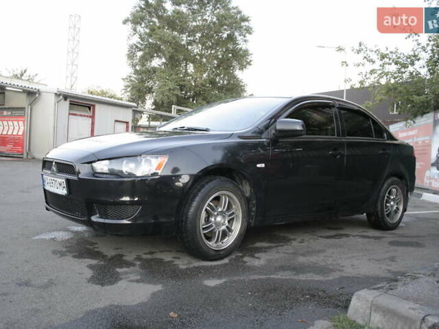 Черный Мицубиси Лансер, объемом двигателя 1.5 л и пробегом 110 тыс. км за 6950 $, фото 2 на Automoto.ua