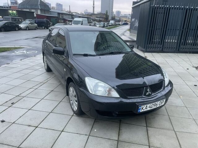 Черный Мицубиси Лансер, объемом двигателя 1.6 л и пробегом 226 тыс. км за 3750 $, фото 5 на Automoto.ua