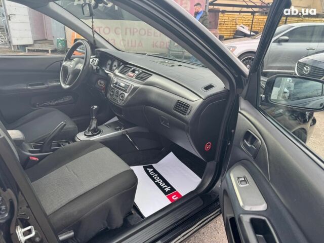 Мицубиси Лансер 2008 в Запорожье на Automoto.ua Черный Мицубиси Лансер, объемом двигателя 1.6 л и пробегом 316 тыс. км за 4290 $, фото 13 на Automoto.ua