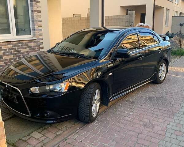 Чорний Міцубісі Lancer, об'ємом двигуна 2 л та пробігом 210 тис. км за 7000 $, фото 4 на Automoto.ua