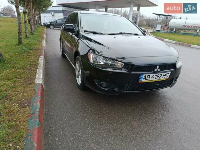 Черный Мицубиси Лансер, объемом двигателя 2 л и пробегом 200 тыс. км за 5100 $, фото 17 на Automoto.ua