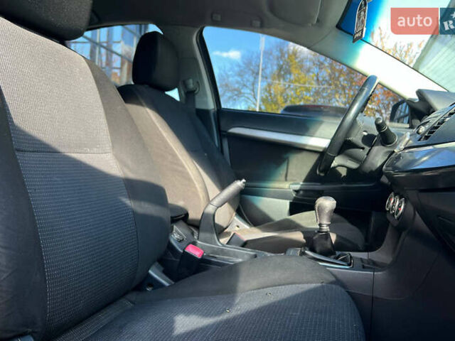 Черный Мицубиси Лансер, объемом двигателя 2 л и пробегом 215 тыс. км за 7000 $, фото 16 на Automoto.ua