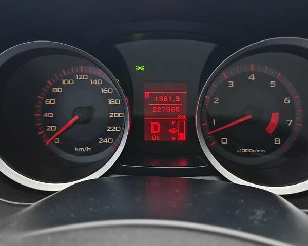 Черный Мицубиси Лансер, объемом двигателя 2 л и пробегом 228 тыс. км за 7000 $, фото 11 на Automoto.ua