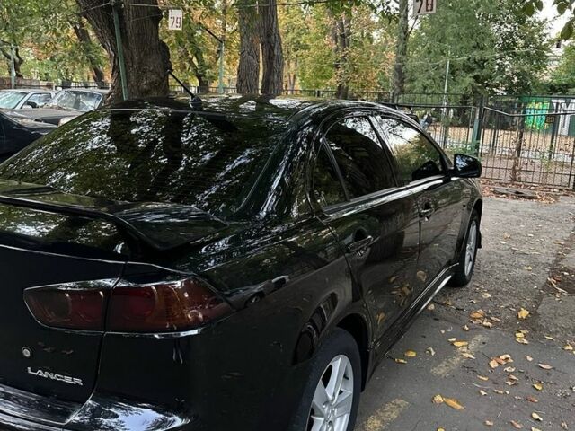 Чорний Міцубісі Lancer, об'ємом двигуна 2 л та пробігом 253 тис. км за 7300 $, фото 5 на Automoto.ua