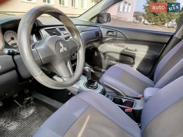Черный Мицубиси Лансер, объемом двигателя 1.58 л и пробегом 78 тыс. км за 6500 $, фото 26 на Automoto.ua