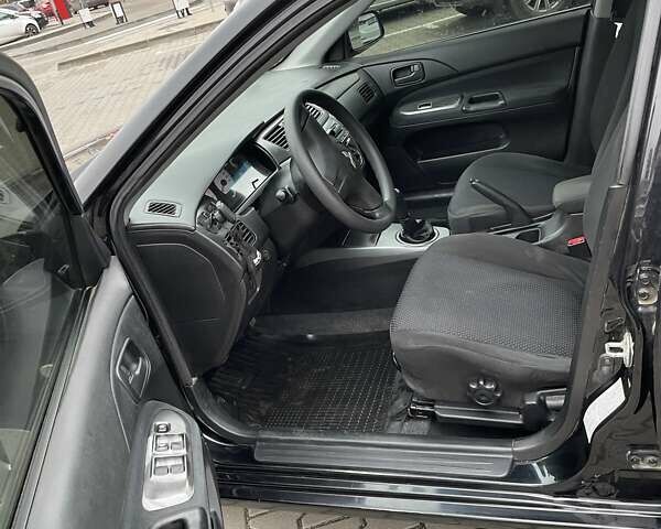 Чорний Міцубісі Lancer, об'ємом двигуна 1.6 л та пробігом 186 тис. км за 5500 $, фото 9 на Automoto.ua