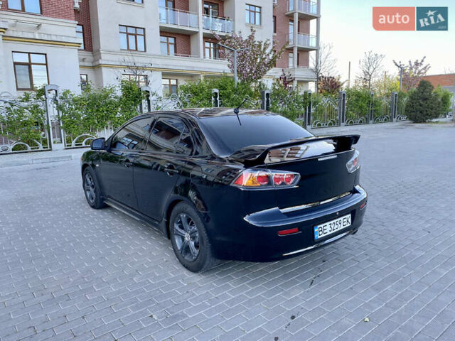 Мицубиси Лансер 2009 в Одессе на Automoto.ua Черный Мицубиси Лансер, объемом двигателя 2 л и пробегом 197 тыс. км за 7250 $, фото 13 на Automoto.ua