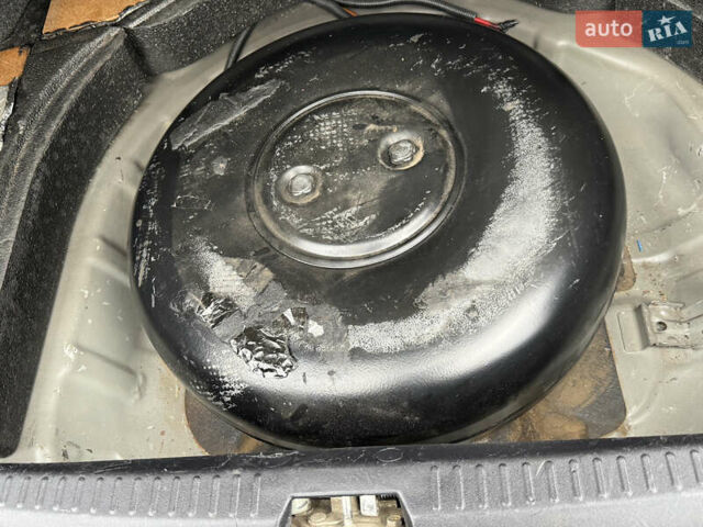 Черный Мицубиси Лансер, объемом двигателя 2 л и пробегом 221 тыс. км за 6750 $, фото 31 на Automoto.ua