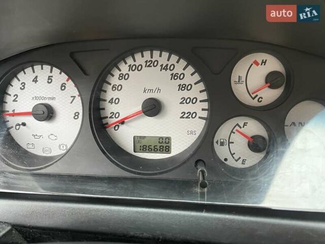 Чорний Міцубісі Lancer, об'ємом двигуна 1.6 л та пробігом 186 тис. км за 5500 $, фото 13 на Automoto.ua