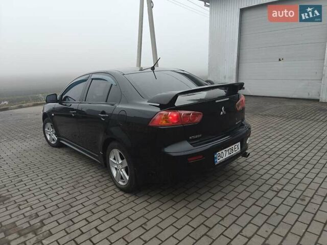 Черный Мицубиси Лансер, объемом двигателя 2 л и пробегом 228 тыс. км за 7000 $, фото 3 на Automoto.ua