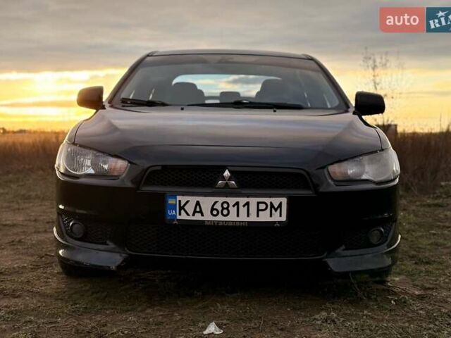 Чорний Міцубісі Lancer, об'ємом двигуна 2 л та пробігом 204 тис. км за 7500 $, фото 4 на Automoto.ua