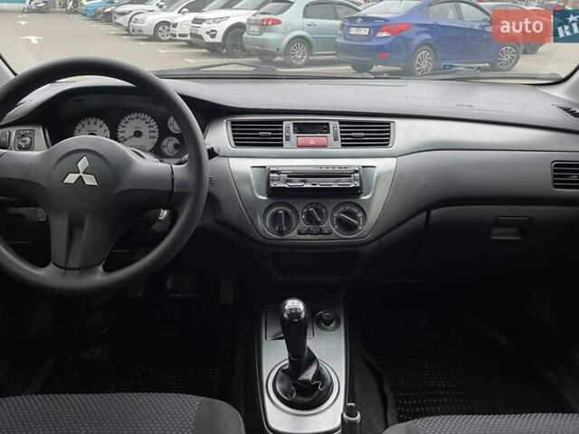 Чорний Міцубісі Lancer, об'ємом двигуна 1.6 л та пробігом 186 тис. км за 5500 $, фото 8 на Automoto.ua