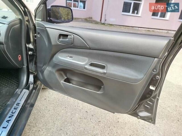 Черный Мицубиси Лансер, объемом двигателя 1.58 л и пробегом 78 тыс. км за 6500 $, фото 22 на Automoto.ua