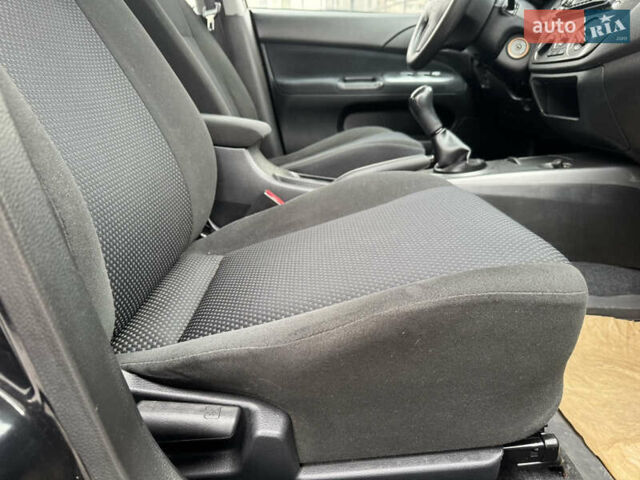 Чорний Міцубісі Lancer, об'ємом двигуна 1.58 л та пробігом 128 тис. км за 5999 $, фото 19 на Automoto.ua