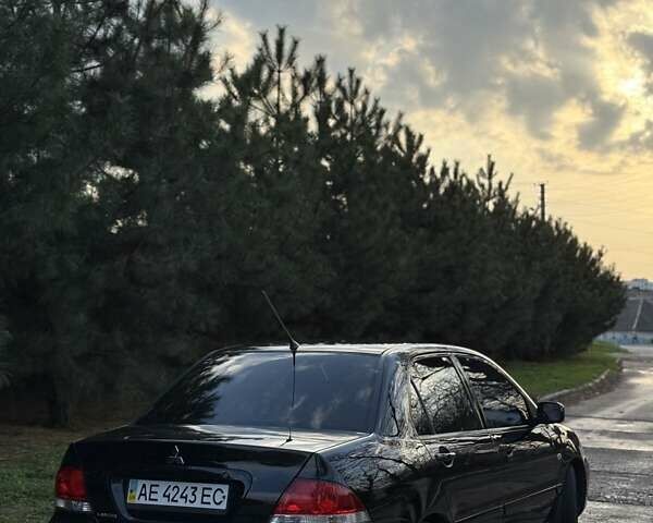 Чорний Міцубісі Lancer, об'ємом двигуна 1.6 л та пробігом 98 тис. км за 5600 $, фото 3 на Automoto.ua