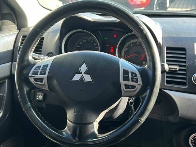 Черный Мицубиси Лансер, объемом двигателя 2 л и пробегом 215 тыс. км за 7000 $, фото 14 на Automoto.ua