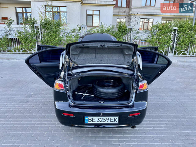 Мицубиси Лансер 2009 в Одессе на Automoto.ua Черный Мицубиси Лансер, объемом двигателя 2 л и пробегом 197 тыс. км за 7250 $, фото 55 на Automoto.ua