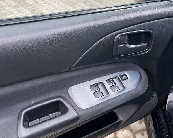 Чорний Міцубісі Lancer, об'ємом двигуна 1.59 л та пробігом 309 тис. км за 3900 $, фото 11 на Automoto.ua