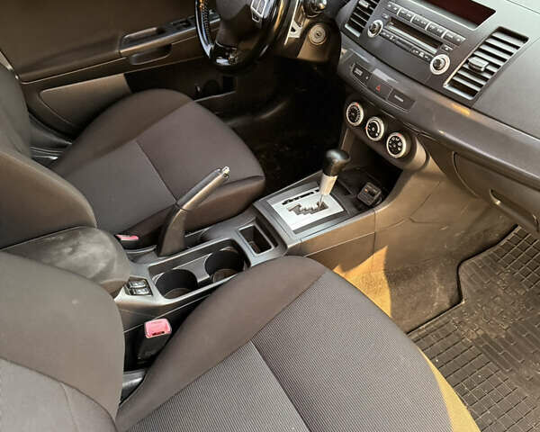 Чорний Міцубісі Lancer, об'ємом двигуна 2 л та пробігом 204 тис. км за 7500 $, фото 7 на Automoto.ua