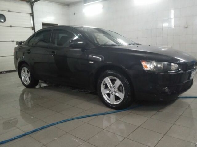 Мицубиси Лансер 2009 в Бобровице на Automoto.ua Черный Мицубиси Лансер, объемом двигателя 1.5 л и пробегом 156 тыс. км за 6700 $, фото 1 на Automoto.ua