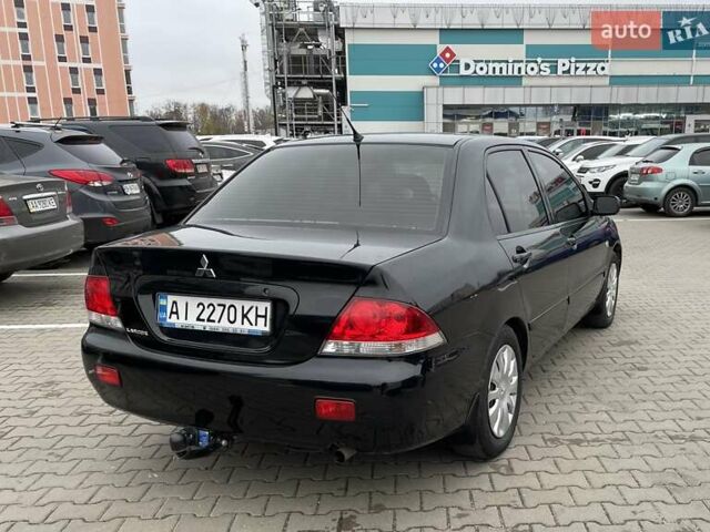 Чорний Міцубісі Lancer, об'ємом двигуна 1.6 л та пробігом 186 тис. км за 5500 $, фото 5 на Automoto.ua