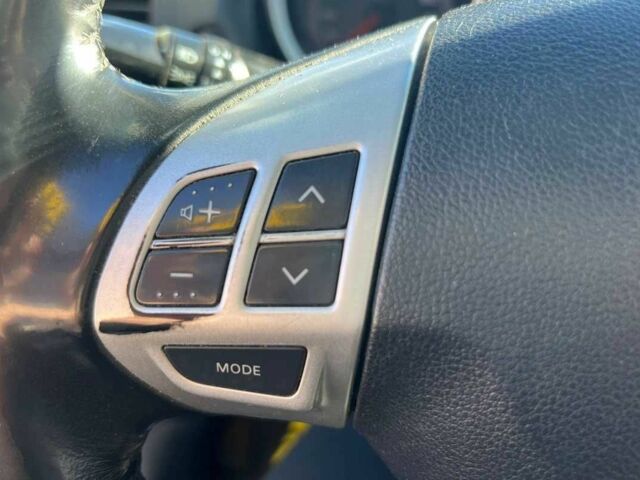 Черный Мицубиси Лансер, объемом двигателя 2 л и пробегом 215 тыс. км за 7000 $, фото 9 на Automoto.ua