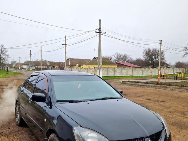 Чорний Міцубісі Lancer, об'ємом двигуна 1.6 л та пробігом 300 тис. км за 3500 $, фото 3 на Automoto.ua
