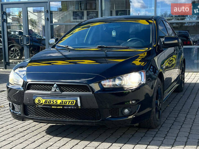 Черный Мицубиси Лансер, объемом двигателя 2 л и пробегом 215 тыс. км за 7000 $, фото 2 на Automoto.ua