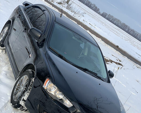 Чорний Міцубісі Lancer, об'ємом двигуна 2 л та пробігом 200 тис. км за 7200 $, фото 11 на Automoto.ua