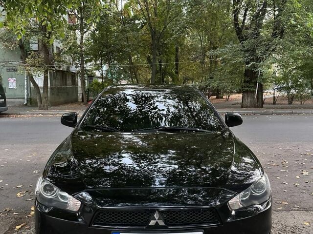 Чорний Міцубісі Lancer, об'ємом двигуна 2 л та пробігом 253 тис. км за 7300 $, фото 2 на Automoto.ua