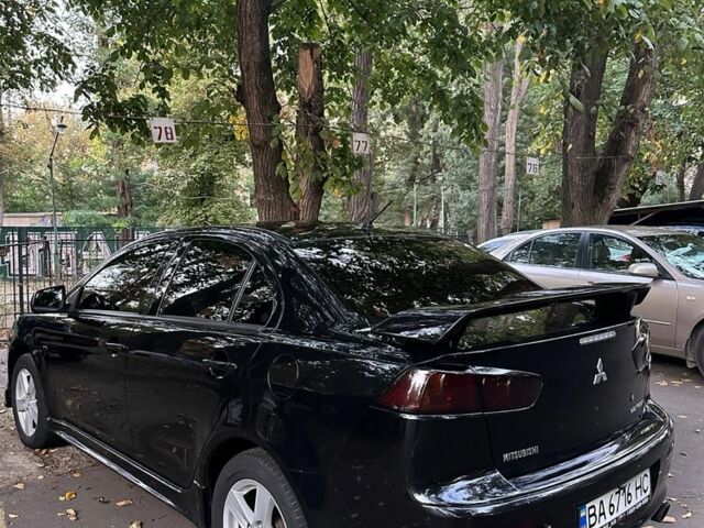 Чорний Міцубісі Lancer, об'ємом двигуна 2 л та пробігом 253 тис. км за 7300 $, фото 3 на Automoto.ua