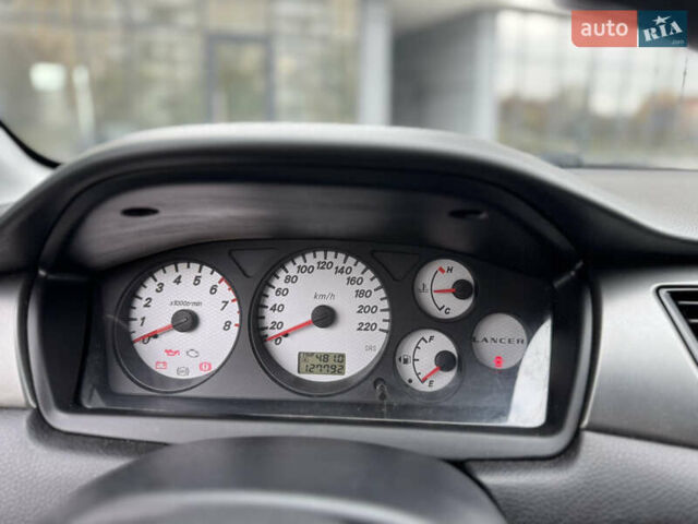 Чорний Міцубісі Lancer, об'ємом двигуна 1.58 л та пробігом 128 тис. км за 5999 $, фото 10 на Automoto.ua