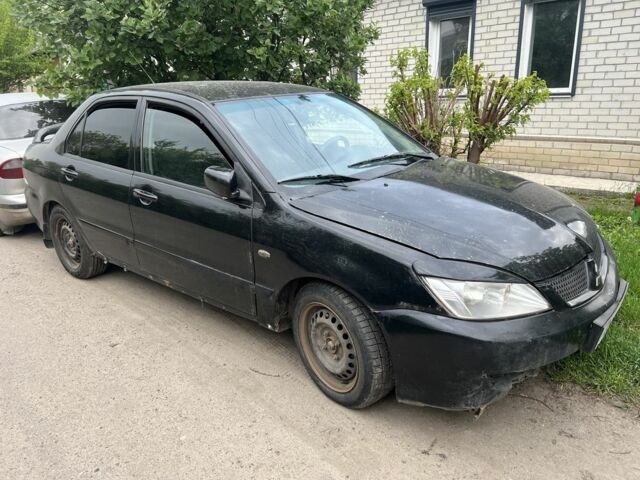 Чорний Міцубісі Lancer, об'ємом двигуна 0 л та пробігом 350 тис. км за 2300 $, фото 1 на Automoto.ua