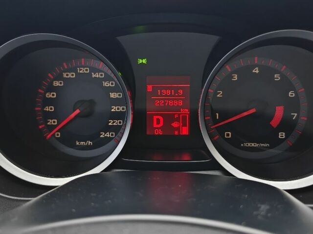 Черный Мицубиси Лансер, объемом двигателя 2 л и пробегом 228 тыс. км за 7000 $, фото 11 на Automoto.ua