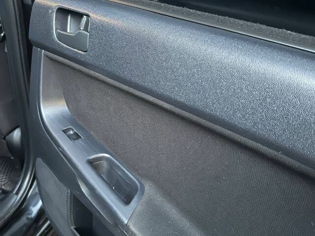 Чорний Міцубісі Lancer, об'ємом двигуна 2 л та пробігом 253 тис. км за 7300 $, фото 14 на Automoto.ua