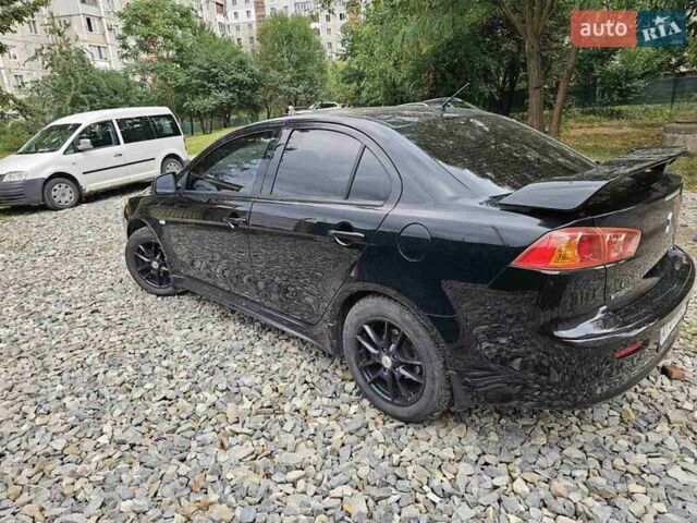 Чорний Міцубісі Lancer, об'ємом двигуна 2 л та пробігом 214 тис. км за 5900 $, фото 5 на Automoto.ua