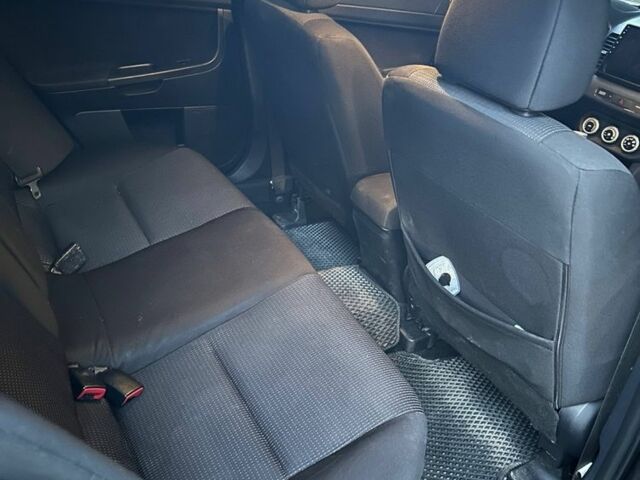 Чорний Міцубісі Lancer, об'ємом двигуна 2 л та пробігом 253 тис. км за 7300 $, фото 15 на Automoto.ua