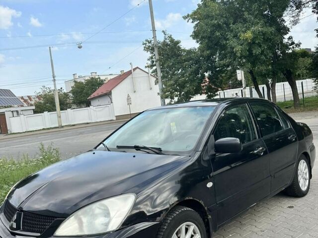 Чорний Міцубісі Lancer, об'ємом двигуна 0 л та пробігом 220 тис. км за 3000 $, фото 7 на Automoto.ua