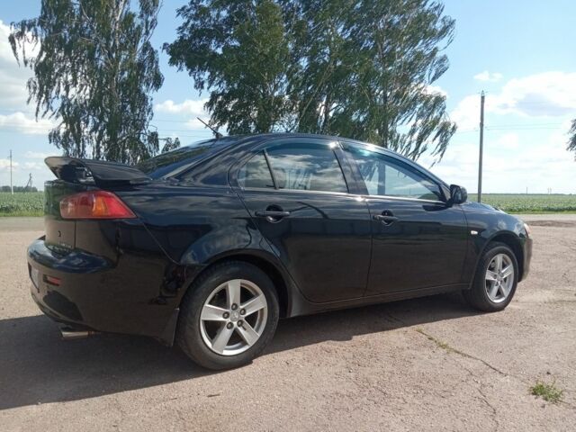 Мицубиси Лансер 2009 в Бобровице на Automoto.ua Черный Мицубиси Лансер, объемом двигателя 1.5 л и пробегом 156 тыс. км за 6700 $, фото 5 на Automoto.ua