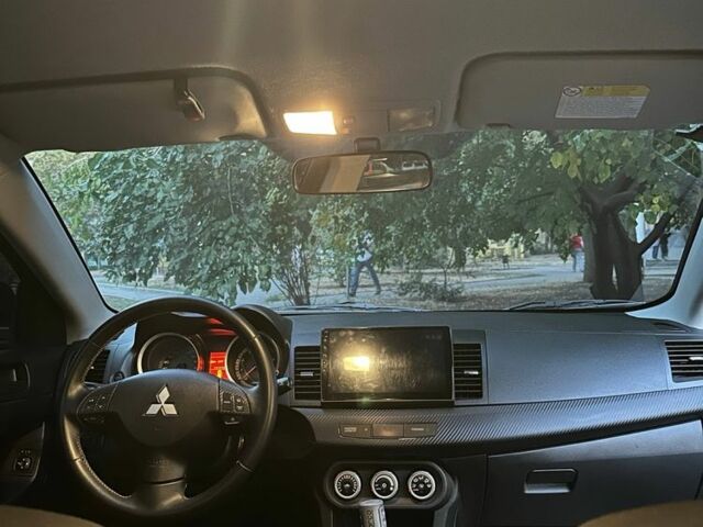 Чорний Міцубісі Lancer, об'ємом двигуна 2 л та пробігом 253 тис. км за 7300 $, фото 12 на Automoto.ua