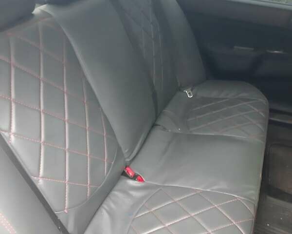 Черный Мицубиси Лансер, объемом двигателя 1.6 л и пробегом 256 тыс. км за 6300 $, фото 4 на Automoto.ua