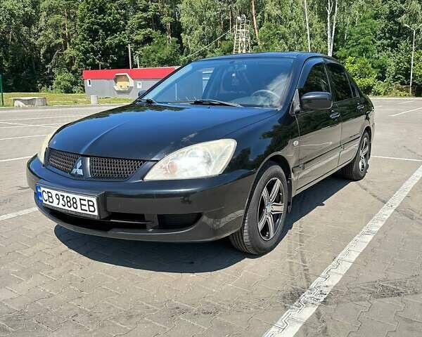 Чорний Міцубісі Lancer, об'ємом двигуна 1.6 л та пробігом 138 тис. км за 5500 $, фото 2 на Automoto.ua