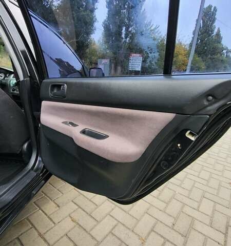 Черный Мицубиси Лансер, объемом двигателя 1.6 л и пробегом 290 тыс. км за 4350 $, фото 17 на Automoto.ua