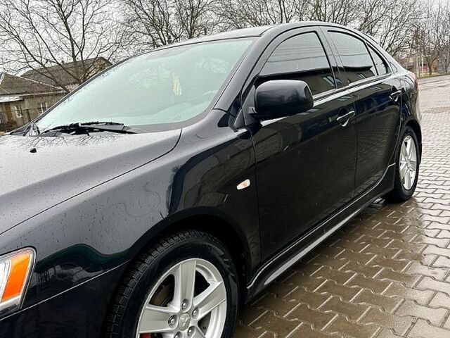 Чорний Міцубісі Lancer, об'ємом двигуна 1.8 л та пробігом 109 тис. км за 7800 $, фото 3 на Automoto.ua