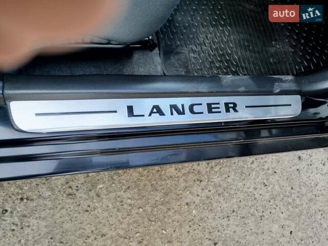 Черный Мицубиси Лансер, объемом двигателя 1.58 л и пробегом 78 тыс. км за 6500 $, фото 29 на Automoto.ua
