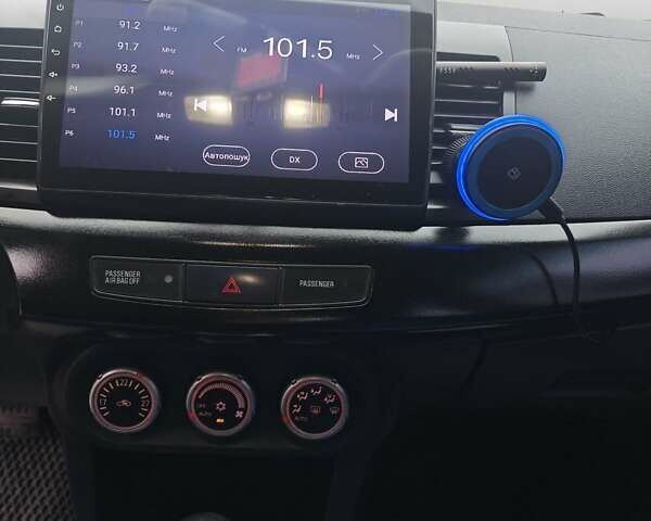 Черный Мицубиси Лансер, объемом двигателя 2 л и пробегом 228 тыс. км за 7000 $, фото 8 на Automoto.ua