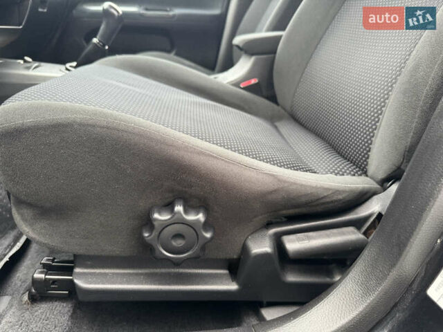 Чорний Міцубісі Lancer, об'ємом двигуна 1.58 л та пробігом 128 тис. км за 5999 $, фото 17 на Automoto.ua