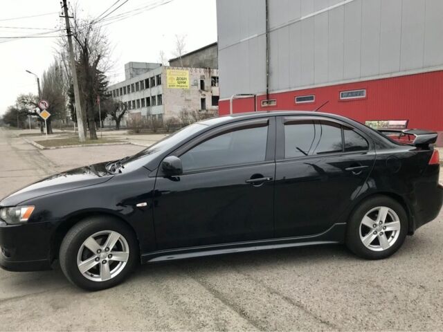 Чорний Міцубісі Lancer, об'ємом двигуна 2 л та пробігом 215 тис. км за 7750 $, фото 16 на Automoto.ua