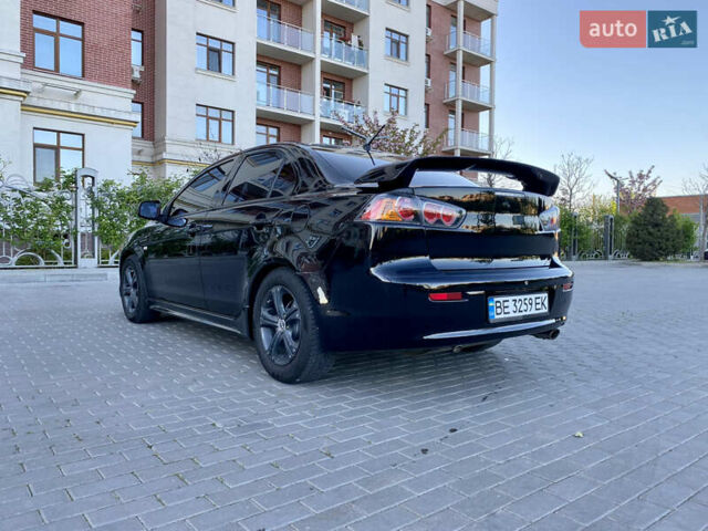 Мицубиси Лансер 2009 в Одессе на Automoto.ua Черный Мицубиси Лансер, объемом двигателя 2 л и пробегом 197 тыс. км за 7250 $, фото 14 на Automoto.ua