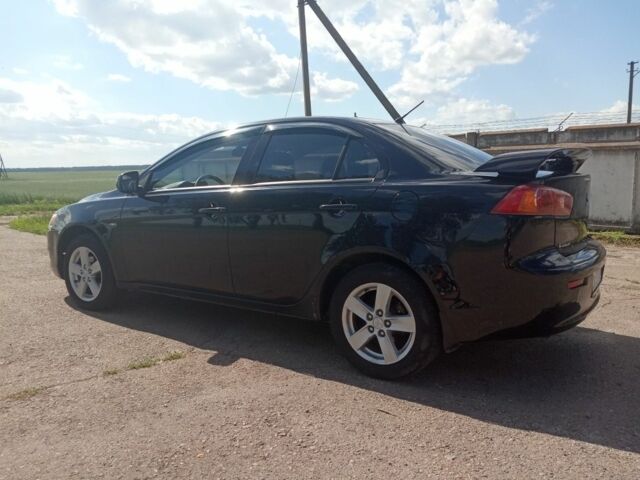 Мицубиси Лансер 2009 в Бобровице на Automoto.ua Черный Мицубиси Лансер, объемом двигателя 1.5 л и пробегом 156 тыс. км за 6700 $, фото 4 на Automoto.ua